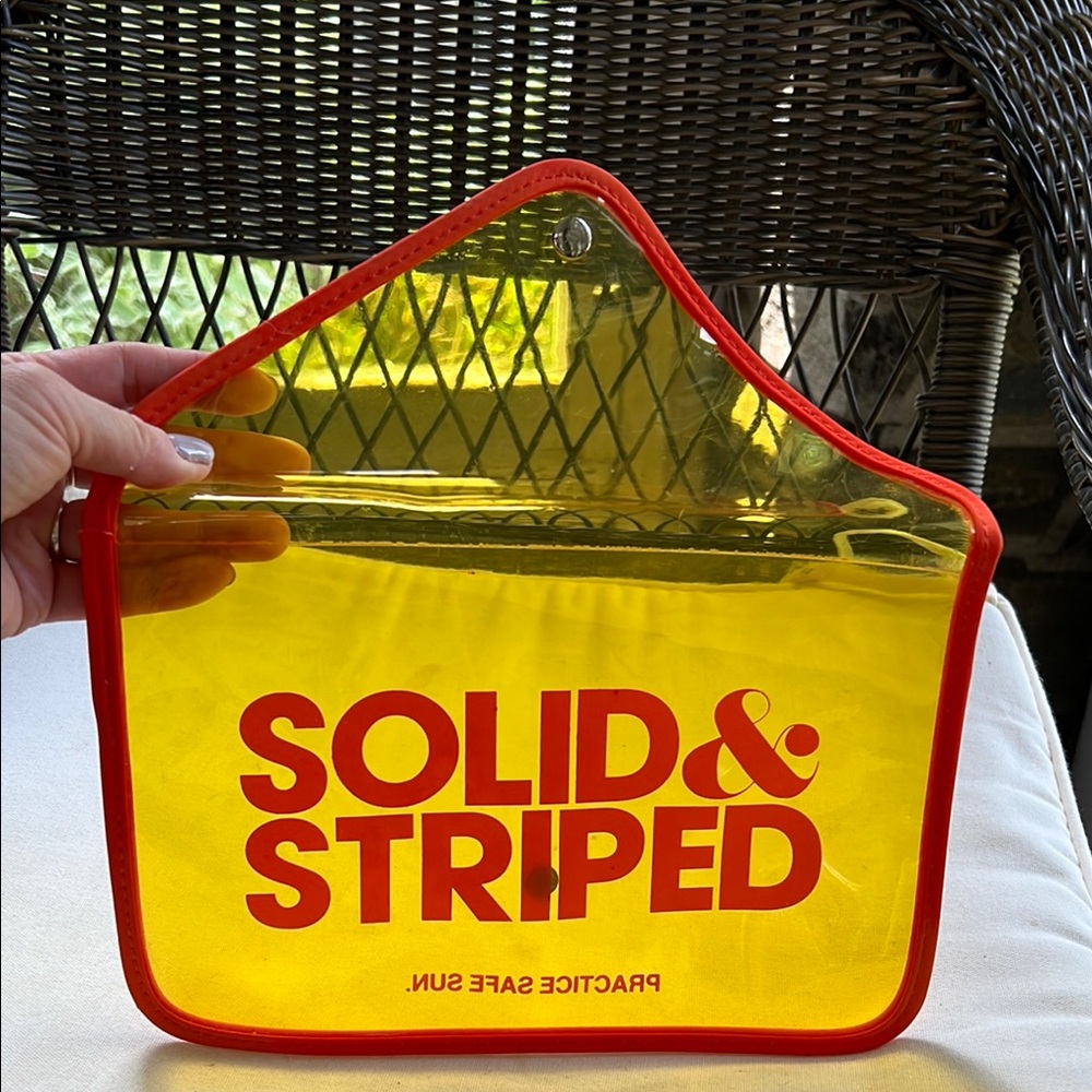 Solid & Striped Clear Travel Pouch – Neon Orange/Yellow – “Practice Safe Sun”